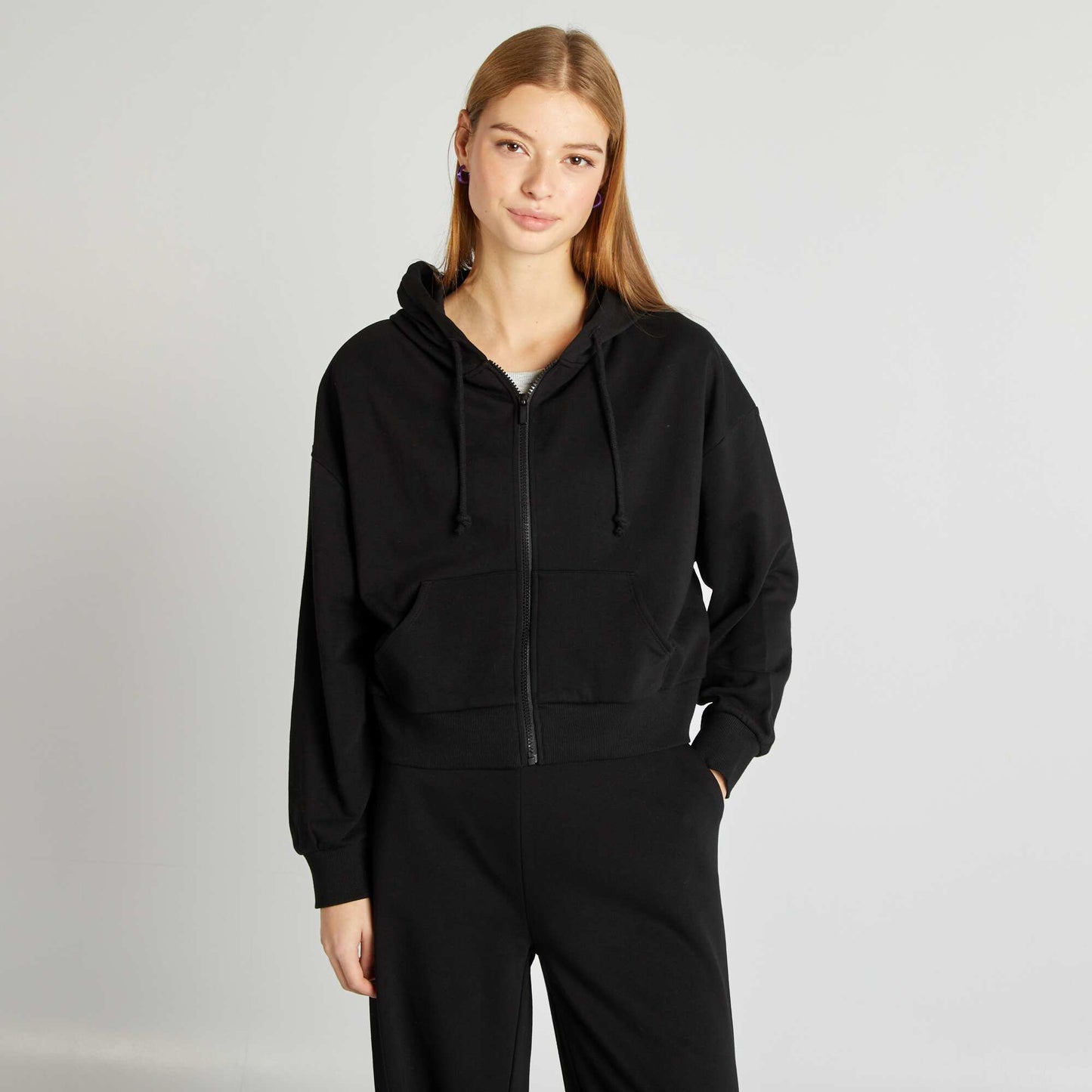 Sweat en molleton uni zippé à capuche NOIR