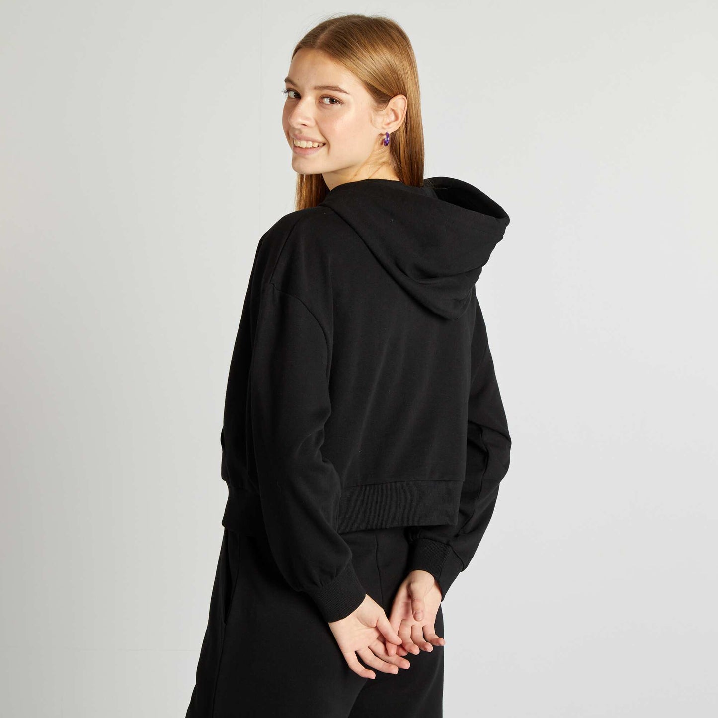 Sweat en molleton uni zippé à capuche NOIR
