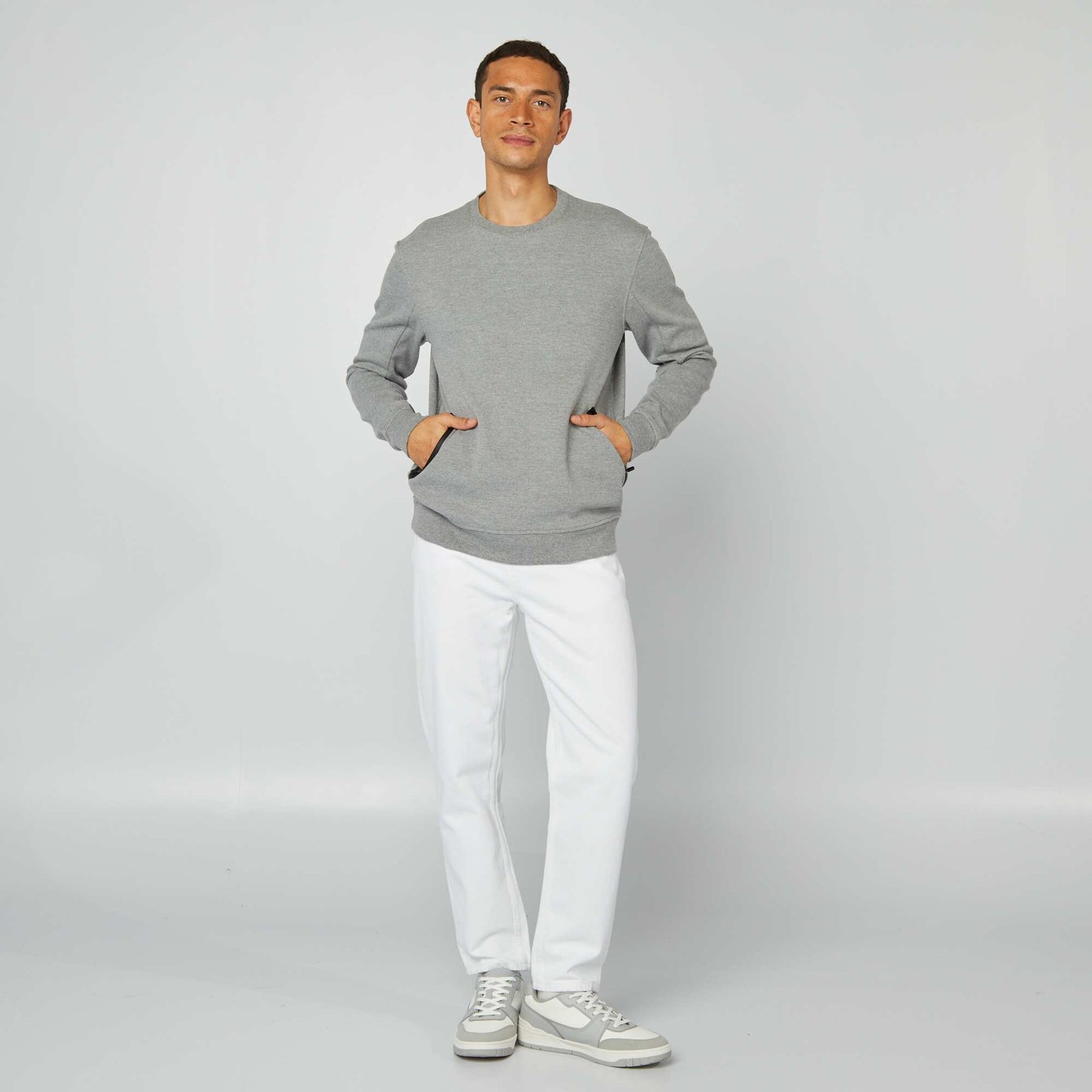 Sweat uni en maille piquée avec poches zippées GRIS