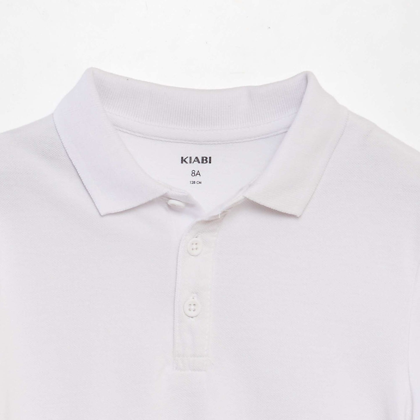 Polo uni en maille piquée BLANC