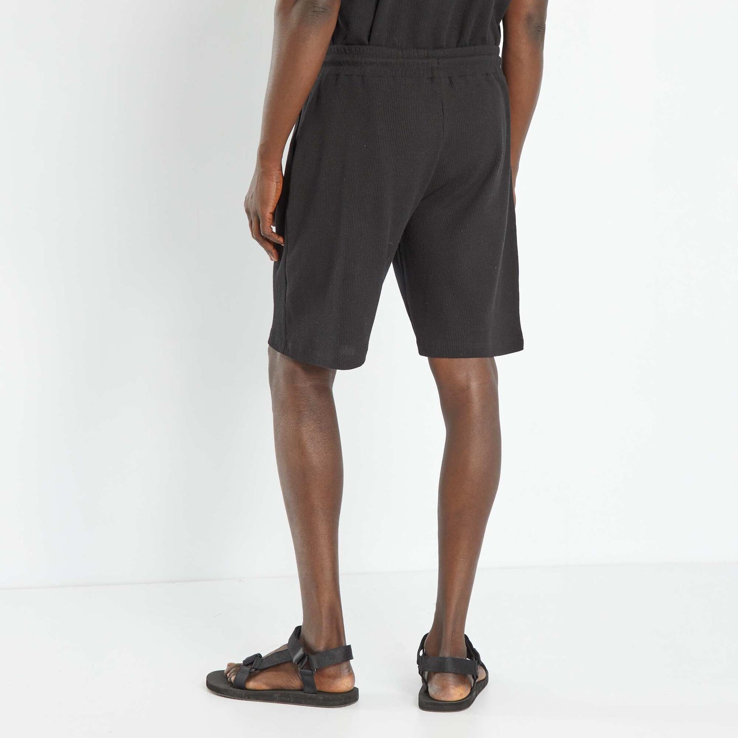 Bermuda uni en nid d'abeille noir