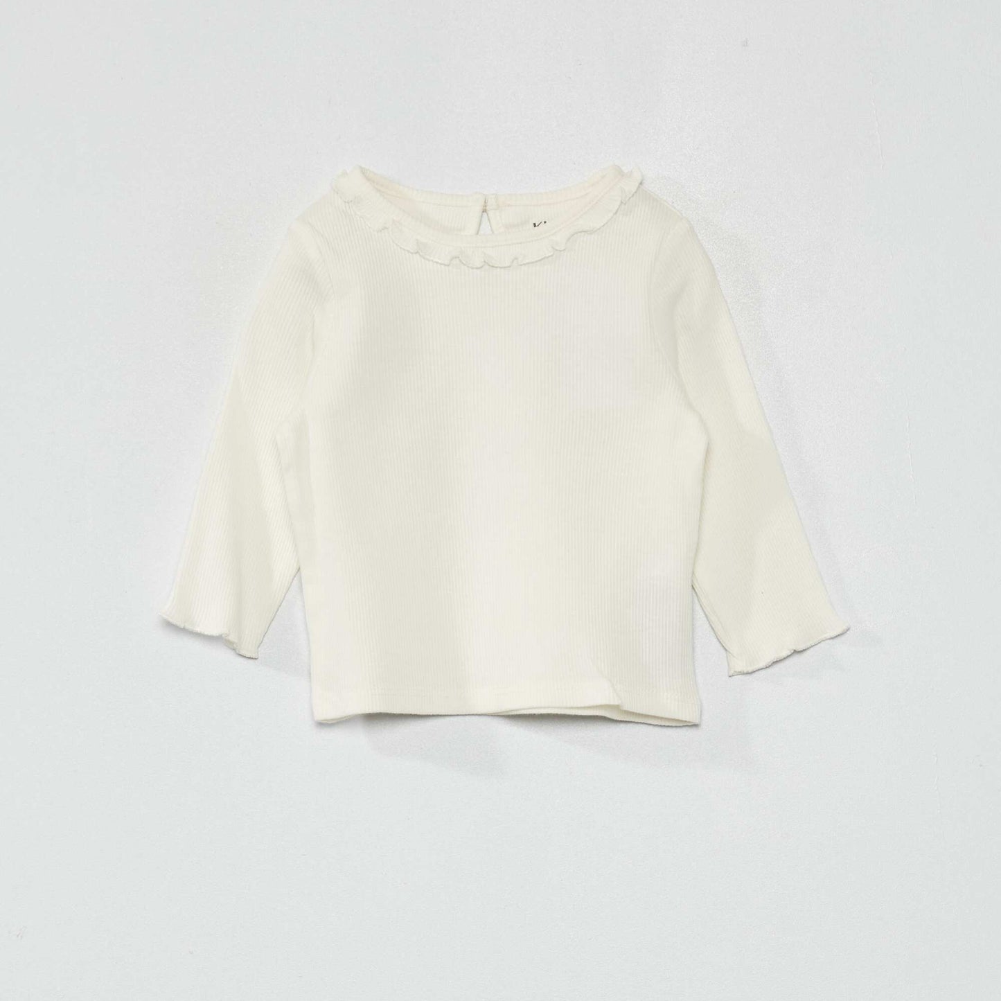 T-shirt en maille c tel e col volant blanc