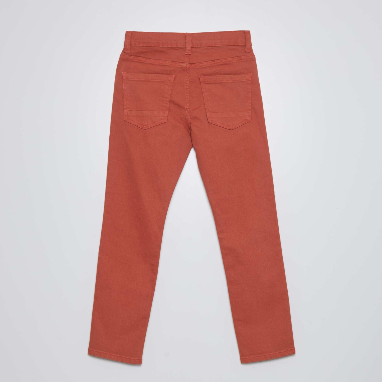 Jean slim 5 poches rouge brique