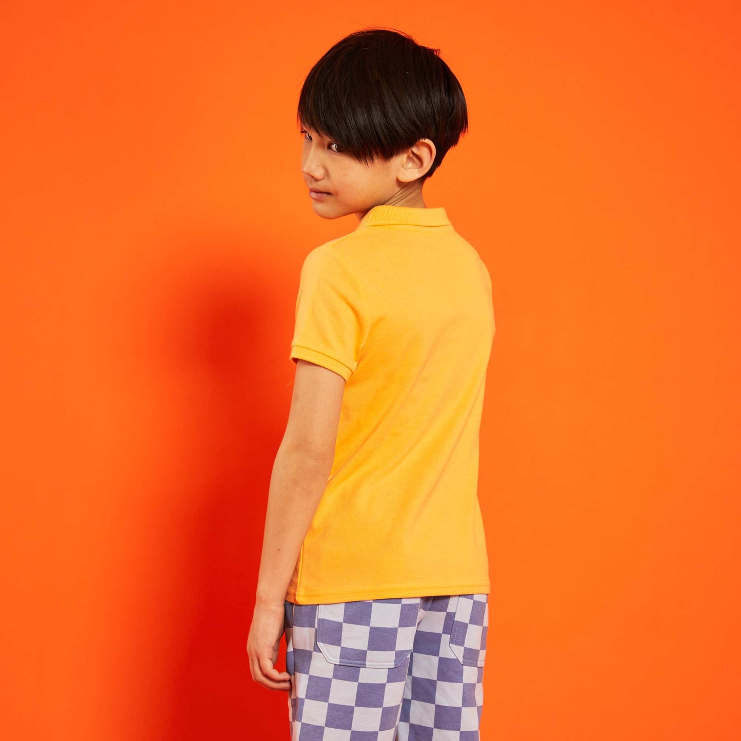 Polo en piqu de coton uni orange abricot
