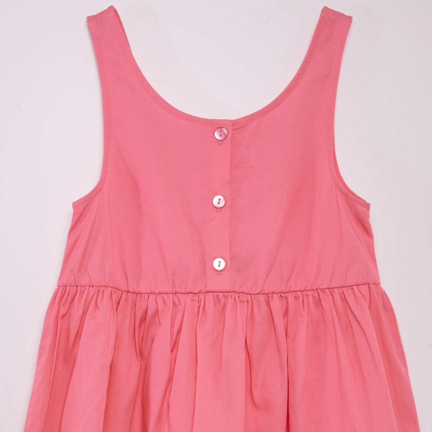 Robe sans manches ouverture au dos rose