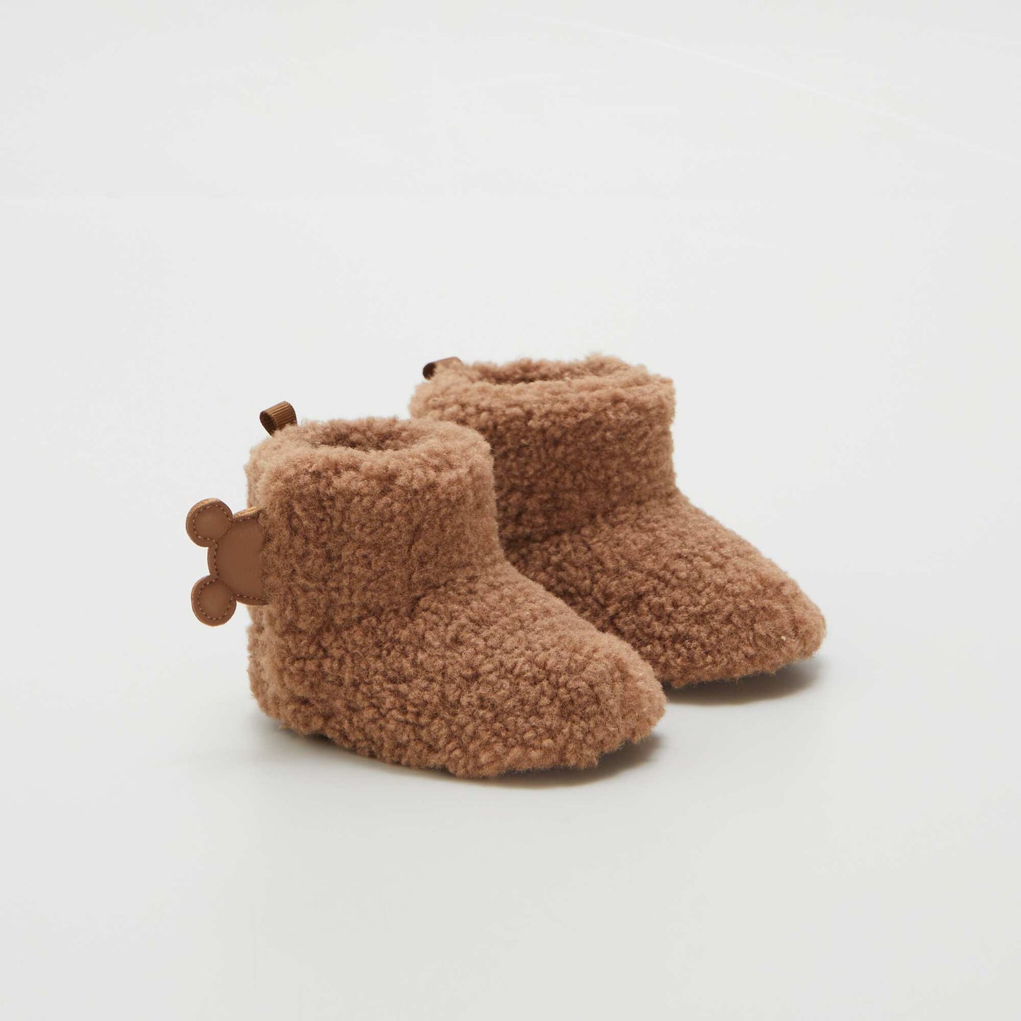 Chaussons en sherpa Beige