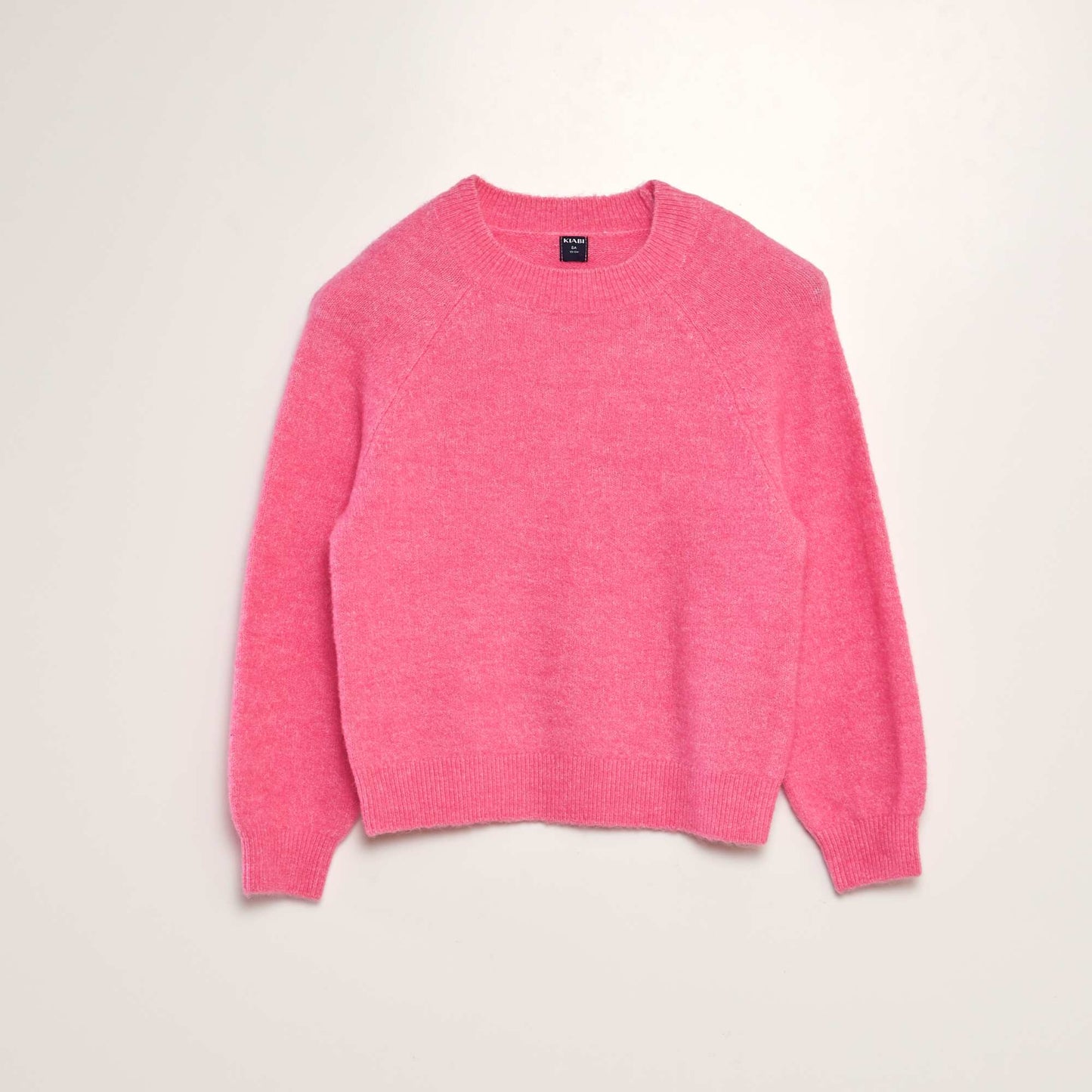 Pull en maille à col rond rose