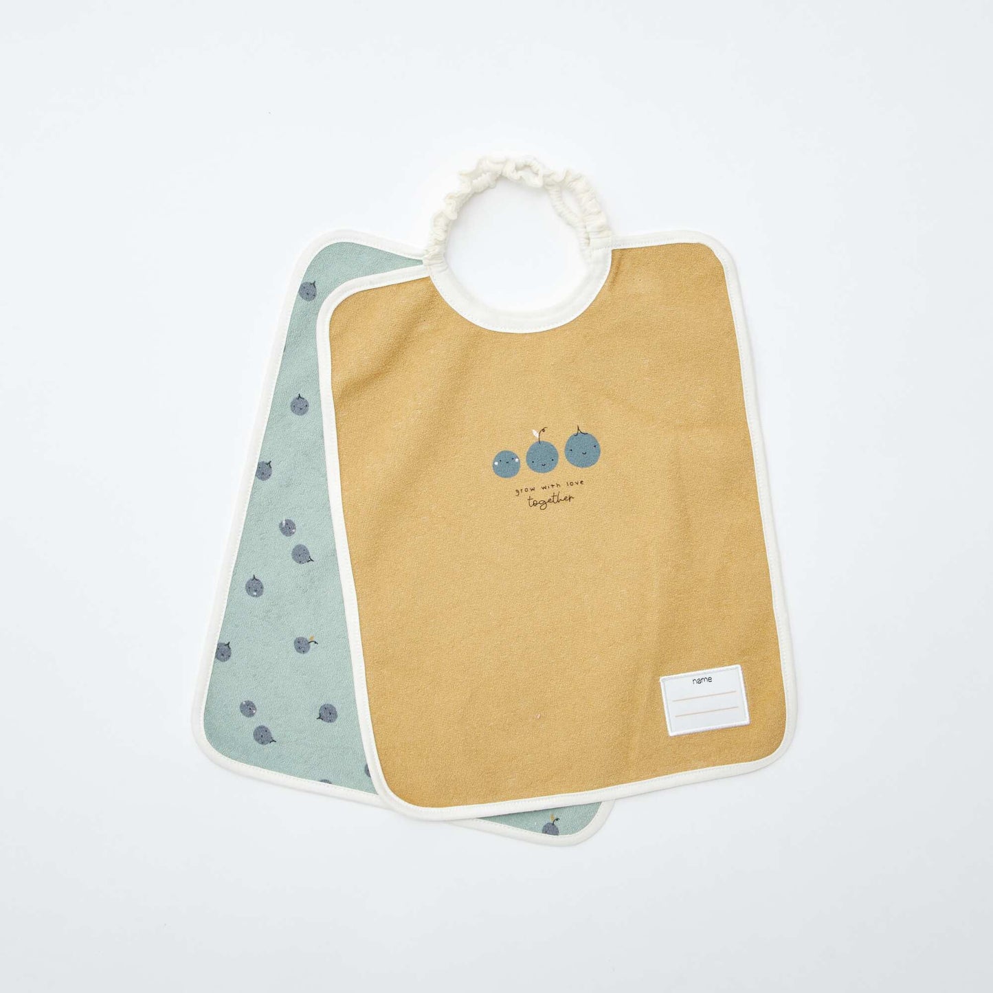 Le lot de 2 bavoirs à l'encolure élastiquée VERT