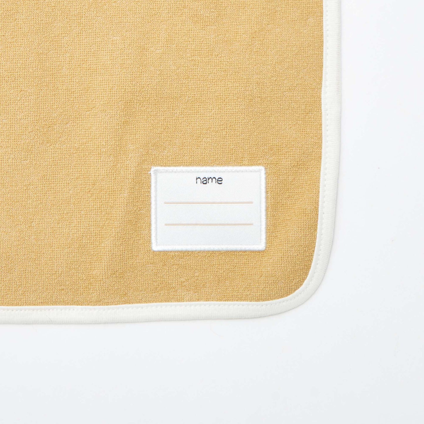 Le lot de 2 bavoirs à l'encolure élastiquée VERT