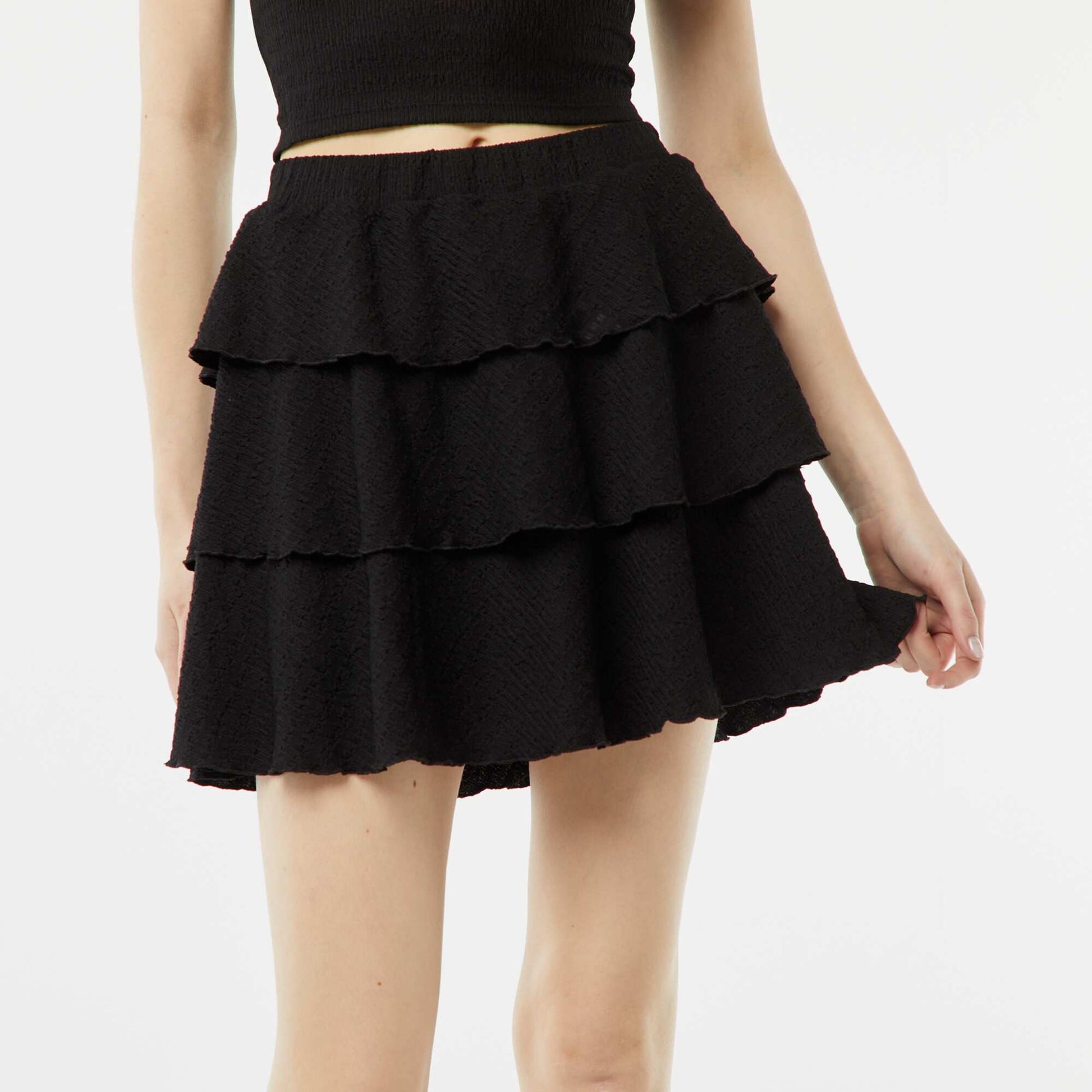 Jupe short courte en matière gaufrée NOIR