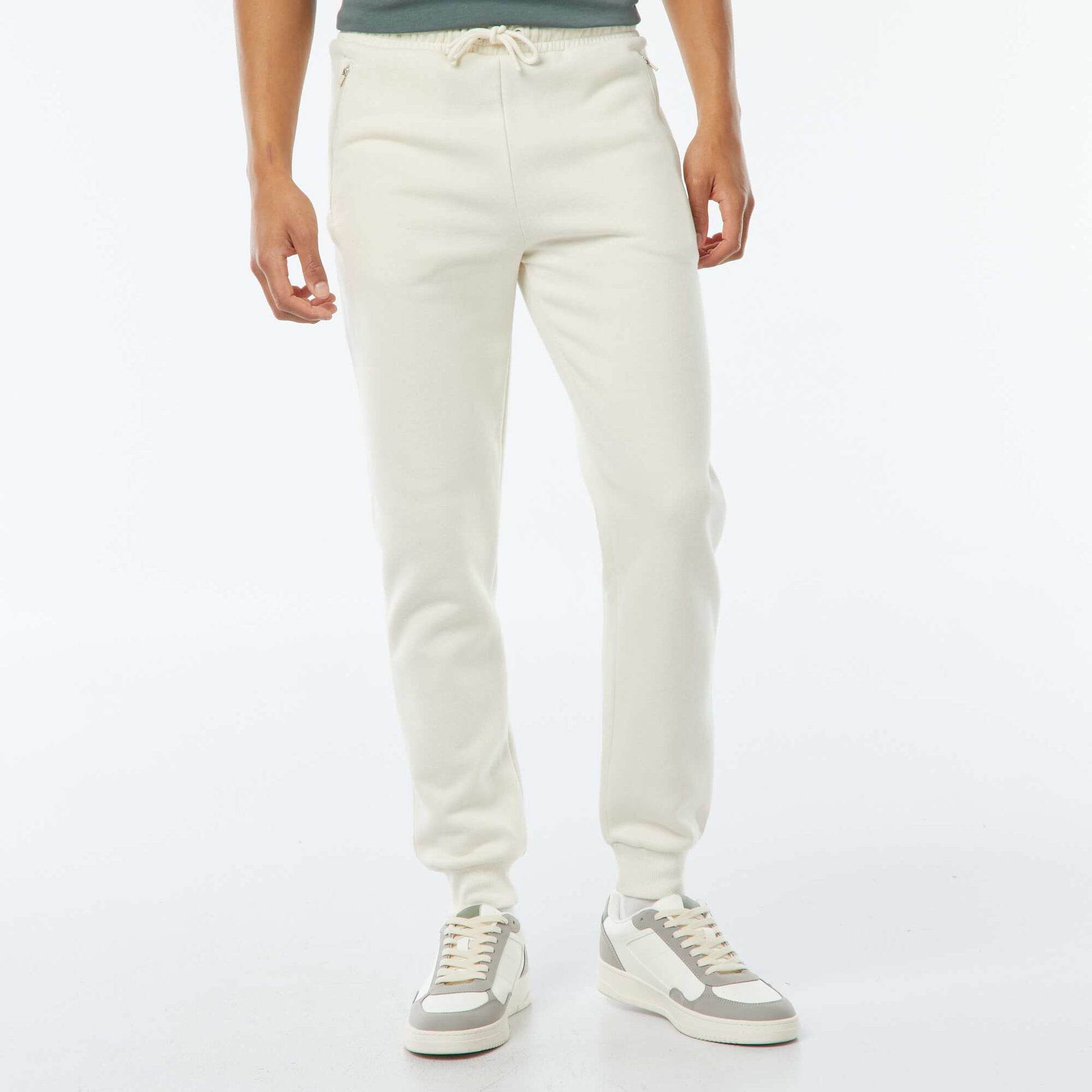 Jogging en molleton gratté avec 2 poches zippées BLANC CASSé
