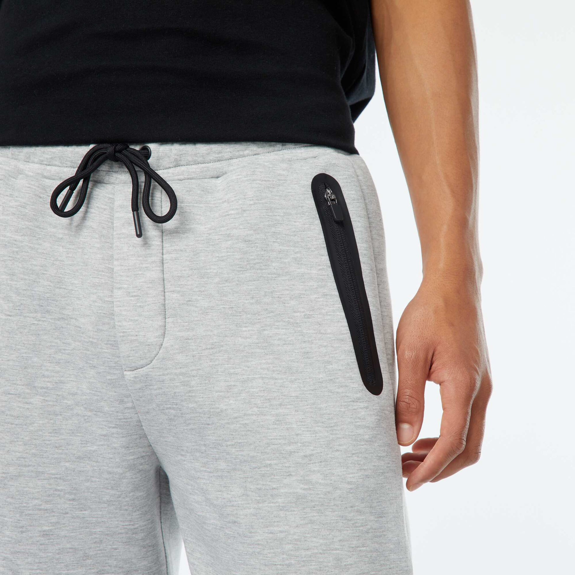 Jogging en molleton type néoprène avec poches zippées GRIS