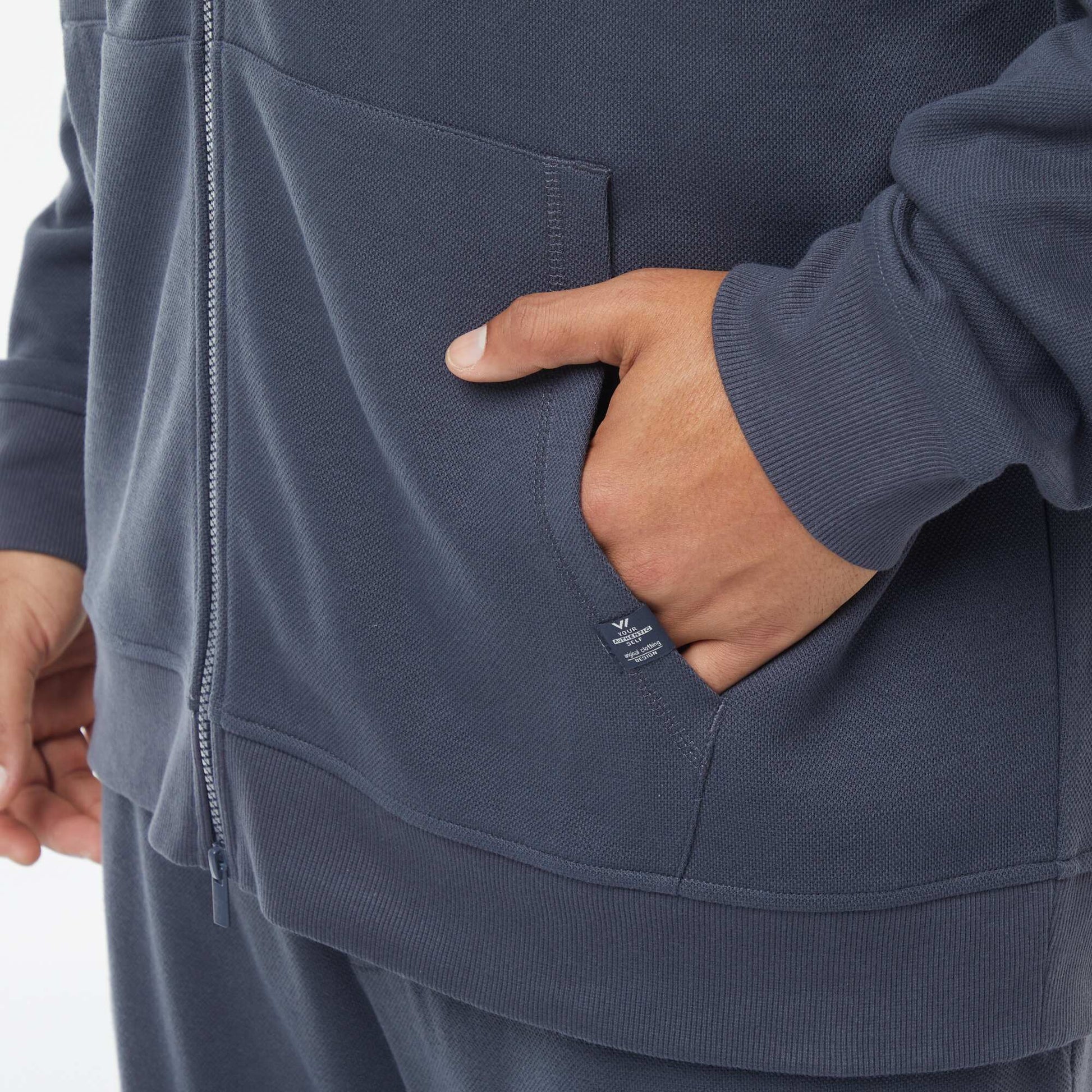 Sweat en maille piquée avec ouverture zippée et capuche BLEU