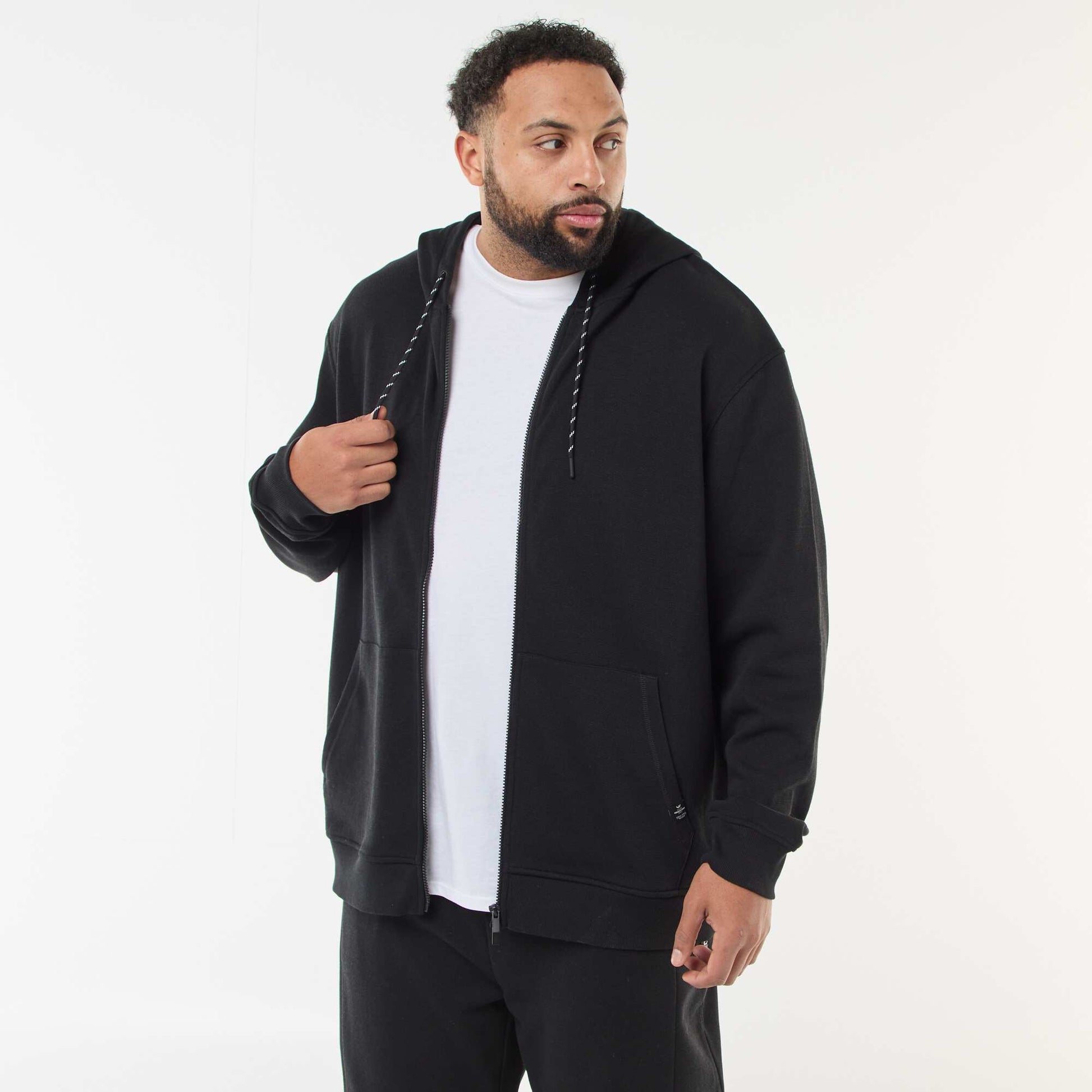 Sweat en maille piquée avec ouverture zippée et capuche NOIR