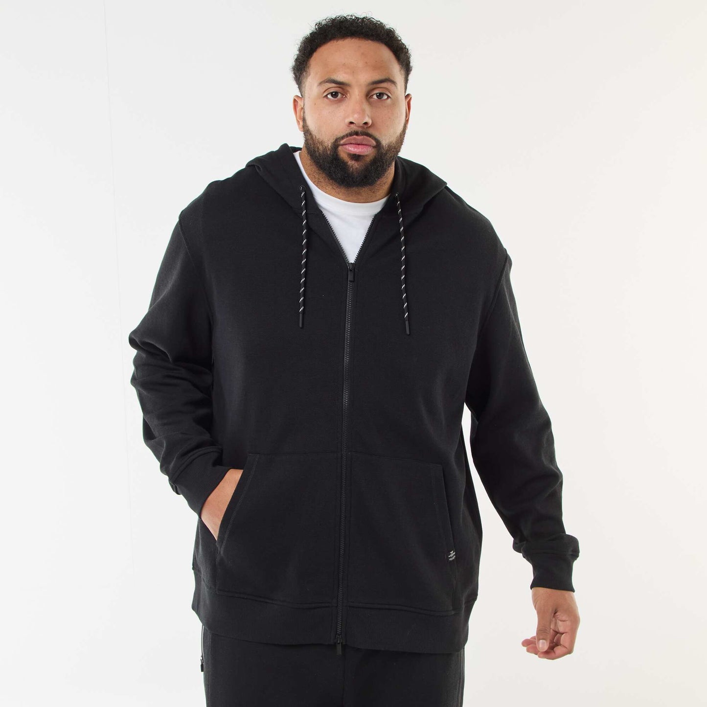 Sweat en maille piquée avec ouverture zippée et capuche NOIR