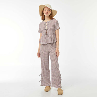 Pantalon large en matière crêpée avec nouettes ROUGE