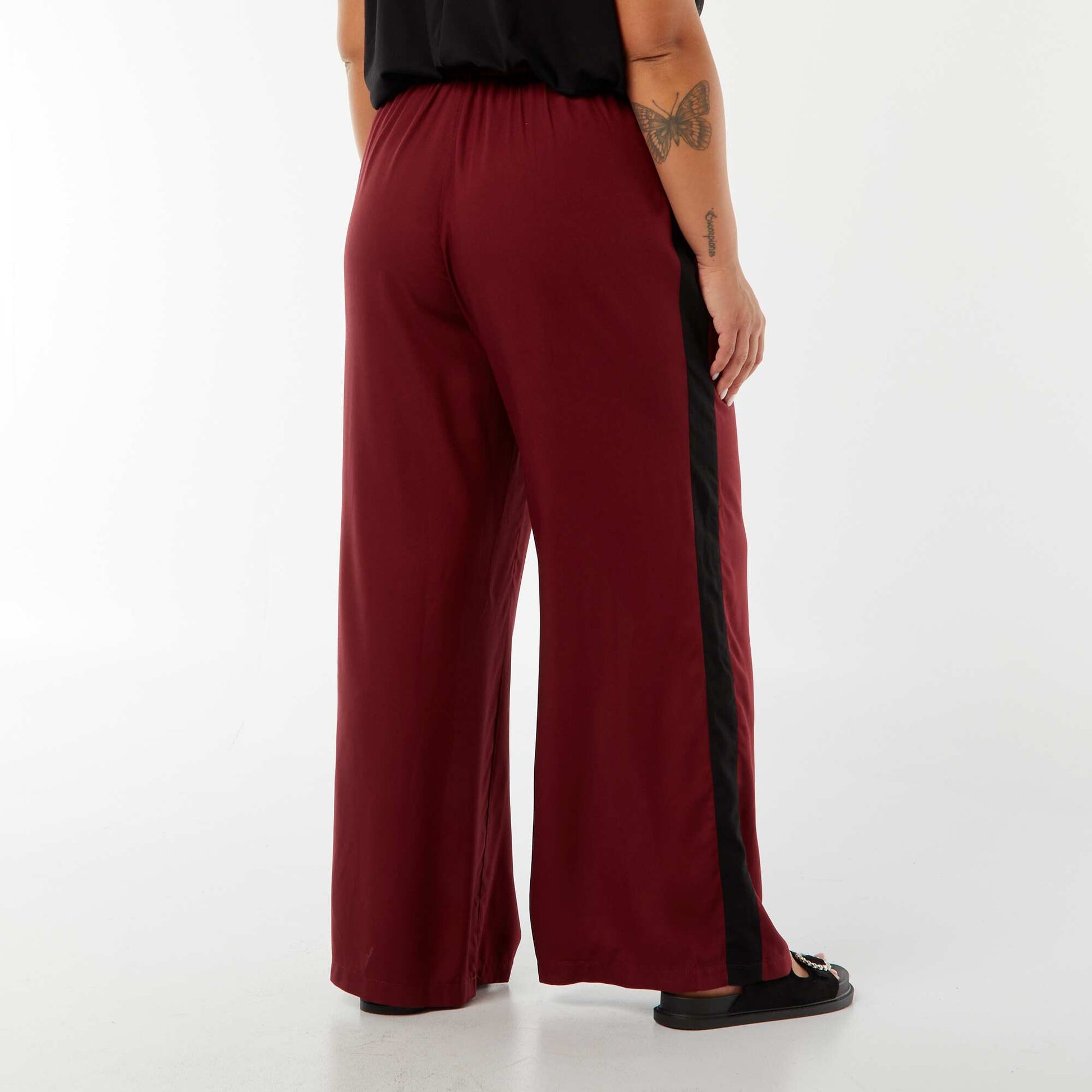 Pantalon large avec bandes contrastantes ROUGE