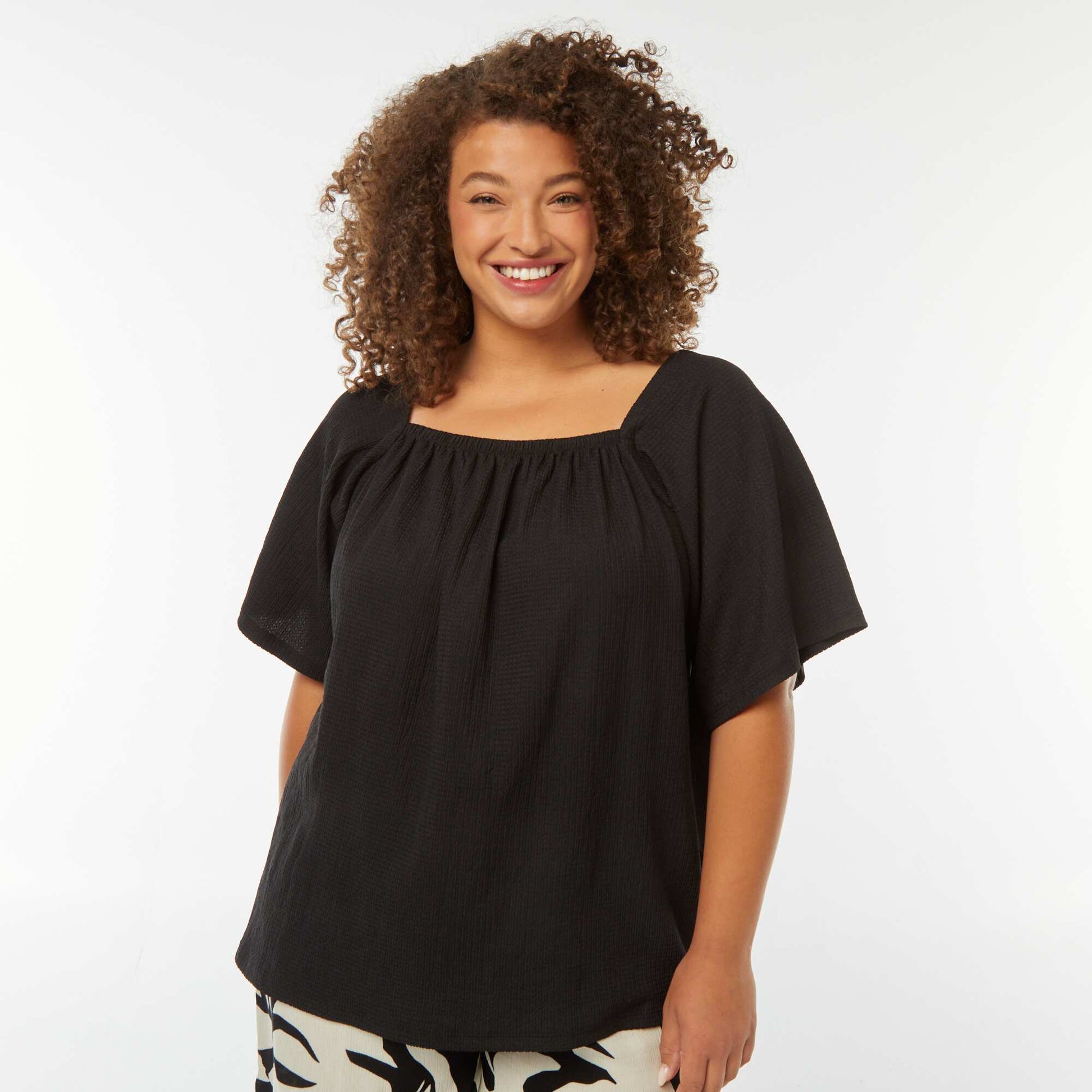 Blouse fluide encolure bardot en maille gaufrée NOIR