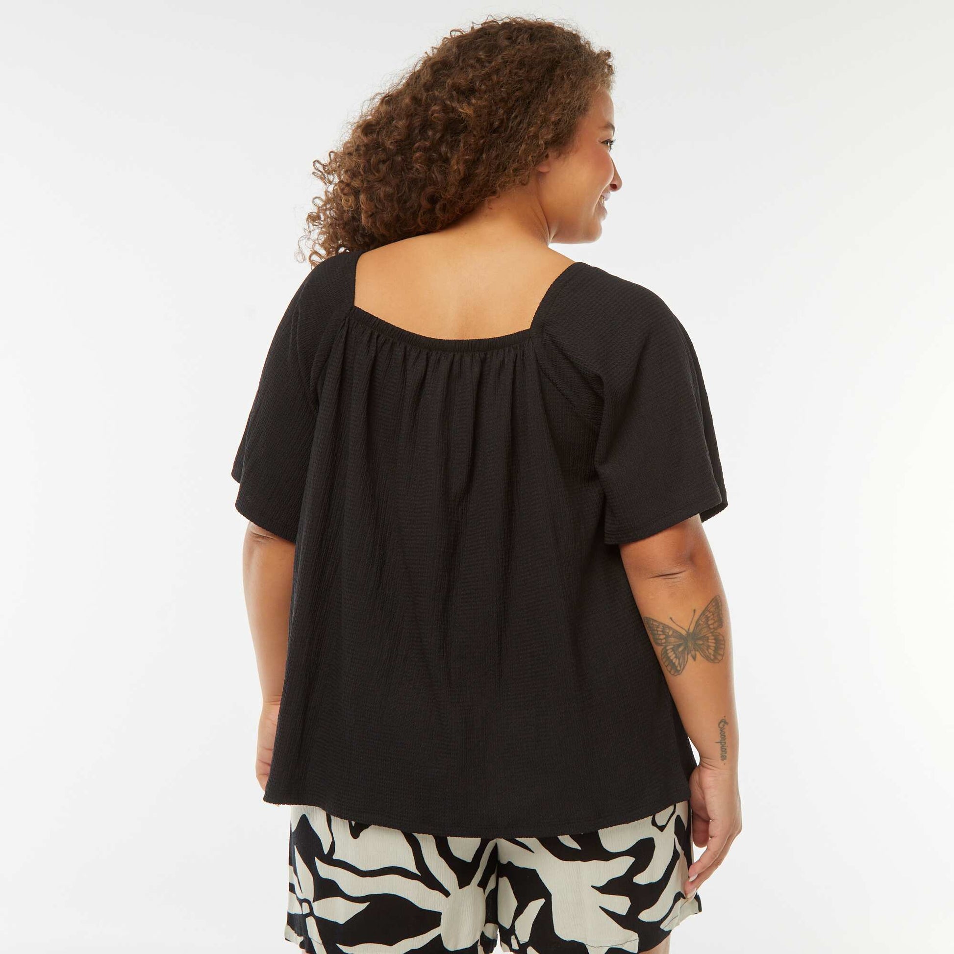 Blouse fluide encolure bardot en maille gaufrée NOIR