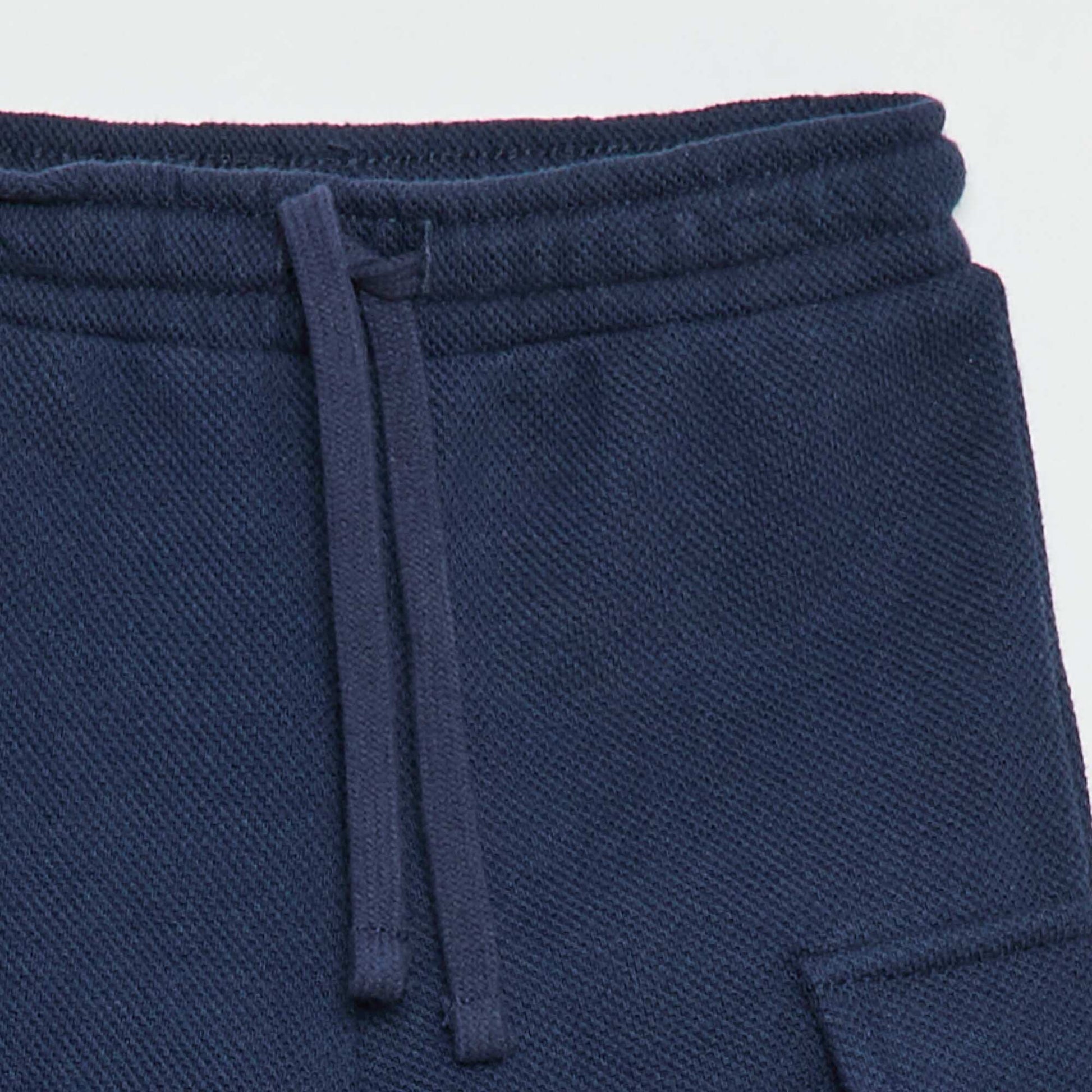Jogging multipoches uni BLEU