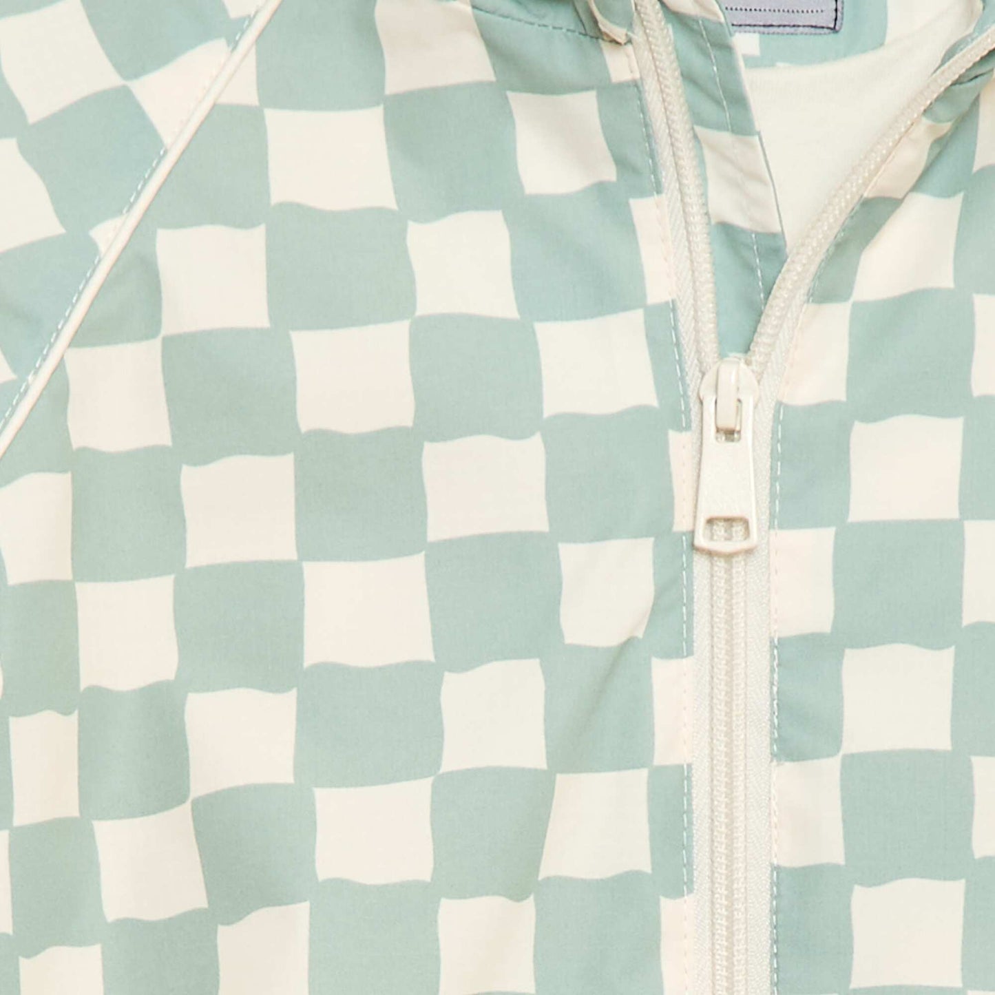 Blouson coupe vent à capuche all-over VERT