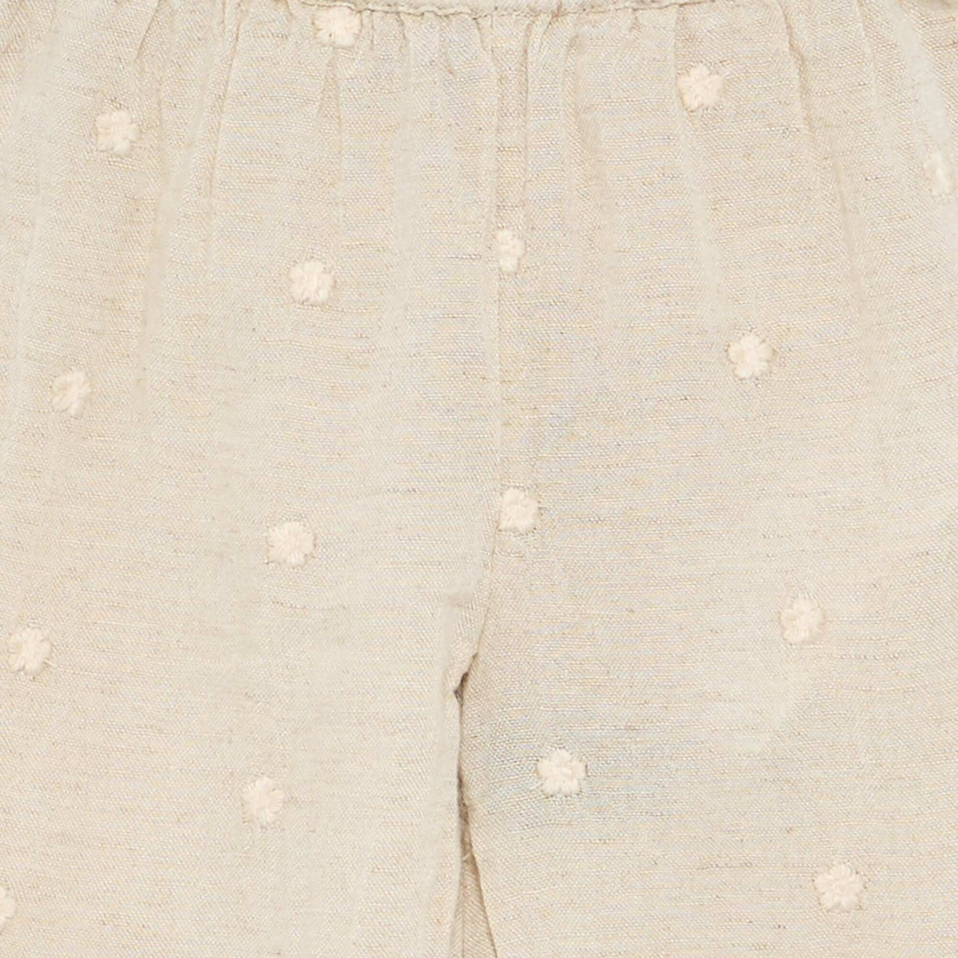 Pantalon avec broderies fleurs BEIGE
