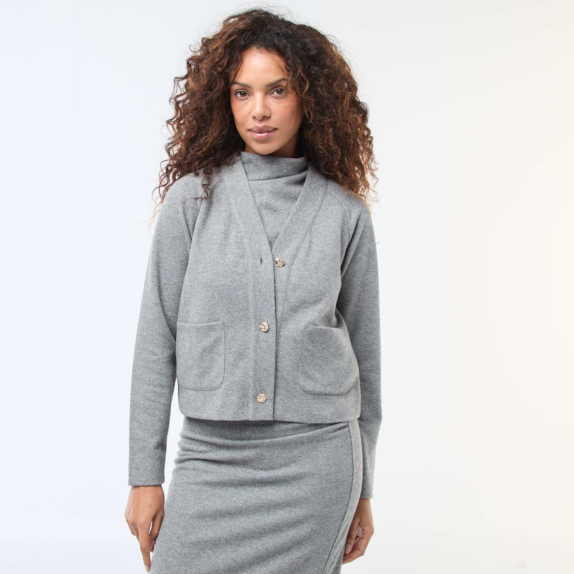 Gilet avec ouverture boutonnée dorée GRIS