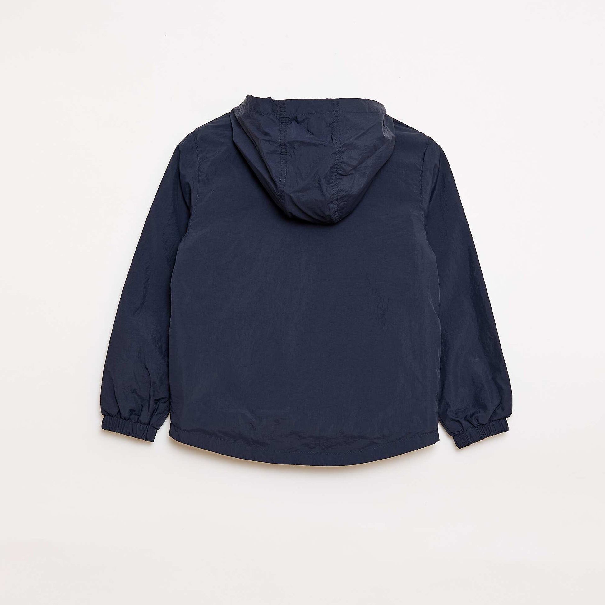 Coupe-vent uni qui se range dans sa capuche BLEU