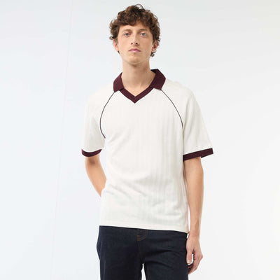 Polo en matière fantaisie col polo sans boutons BLANC