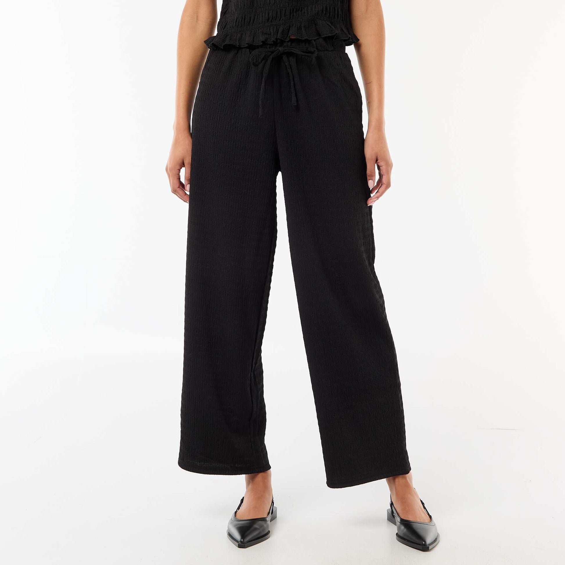 Pantalon large ne maille smockée NOIR