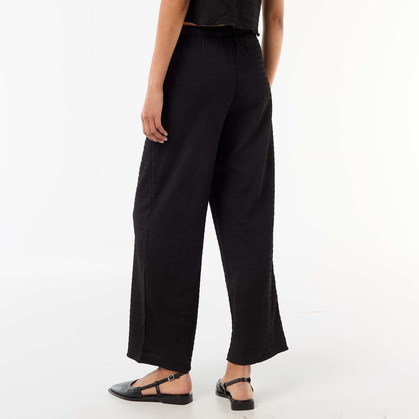 Pantalon large ne maille smockée NOIR