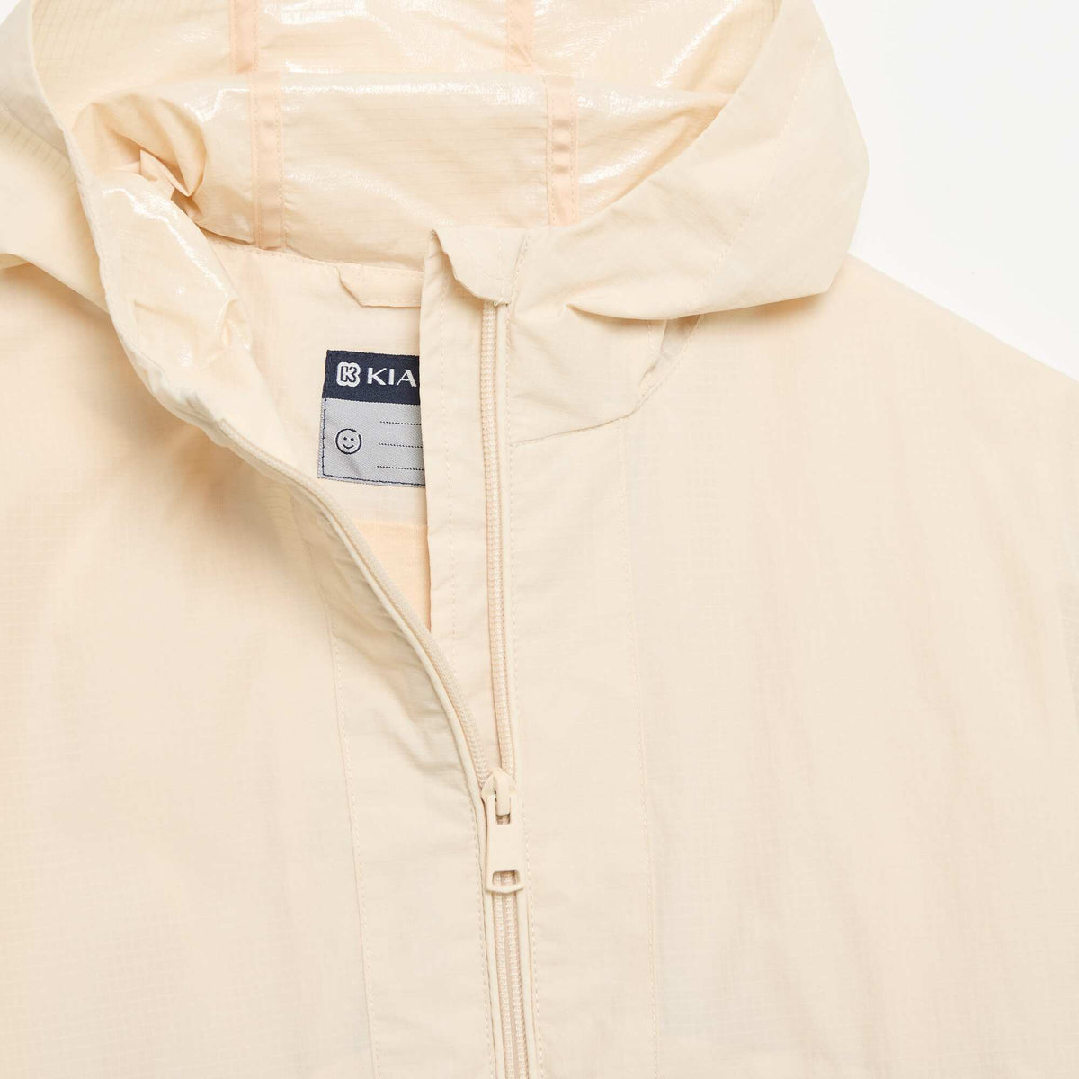 Blouson coupe-vent à capuche BEIGE