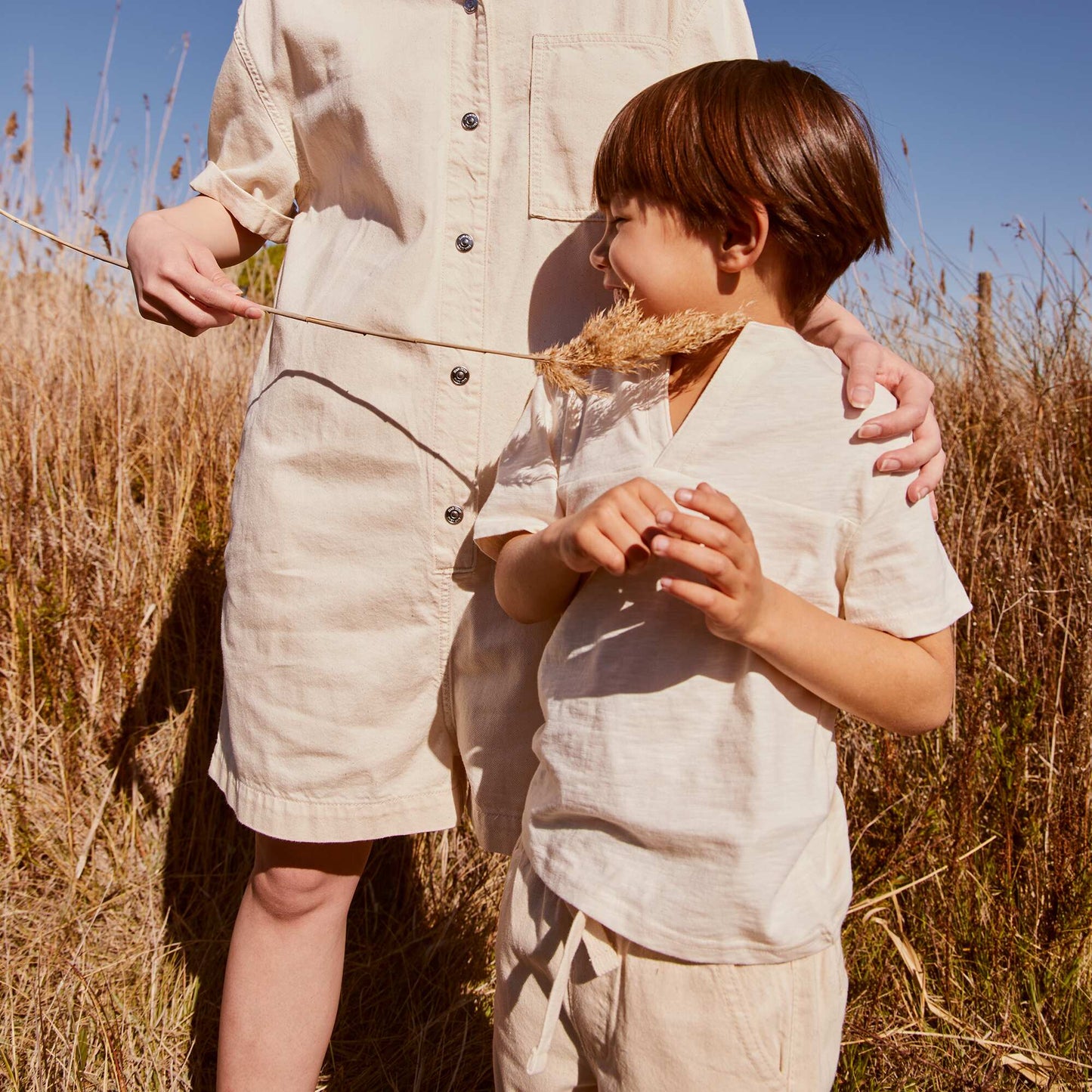 Tee-shirt en maille moulin e large col V Cr me