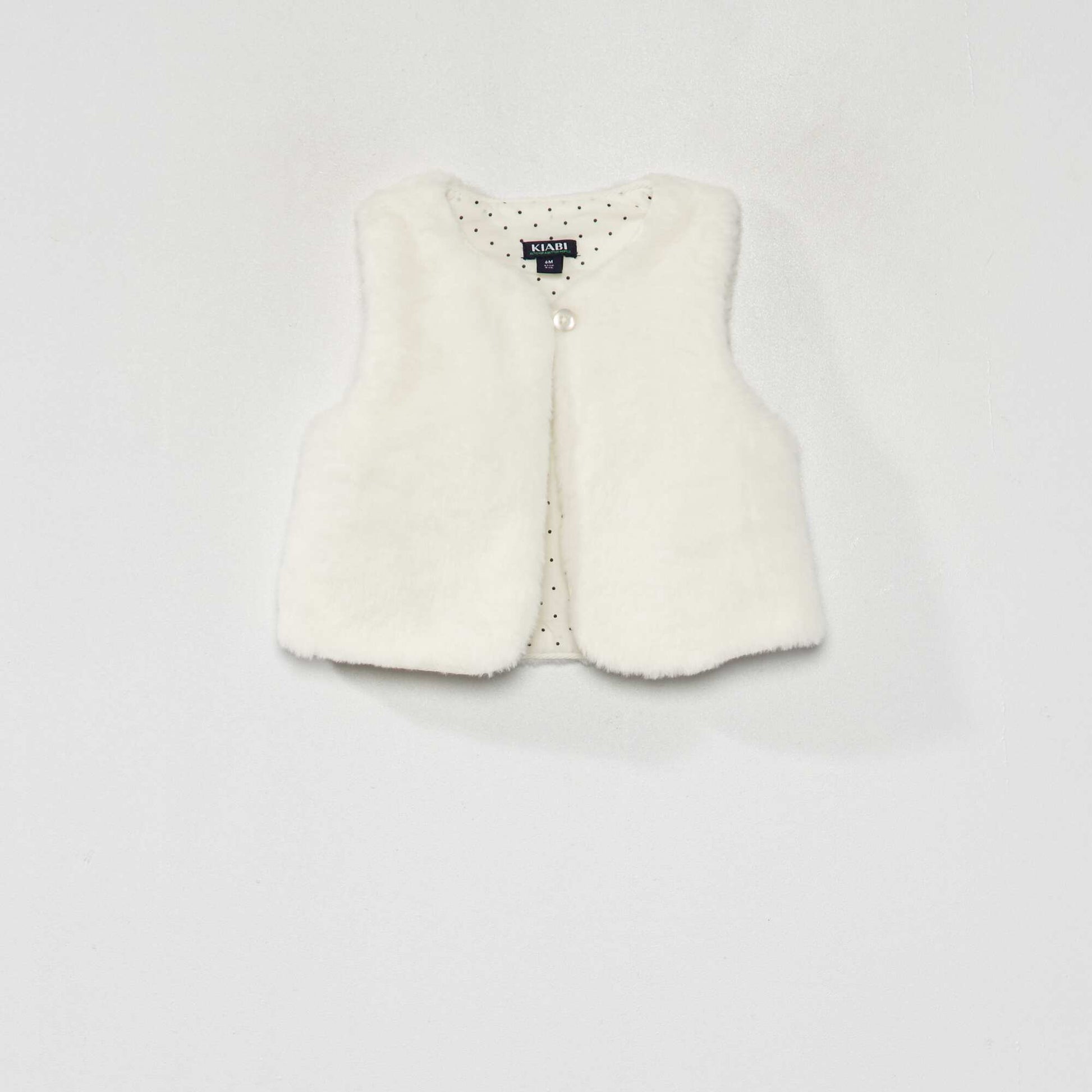 Veste sans manches fausse fourrure blanc