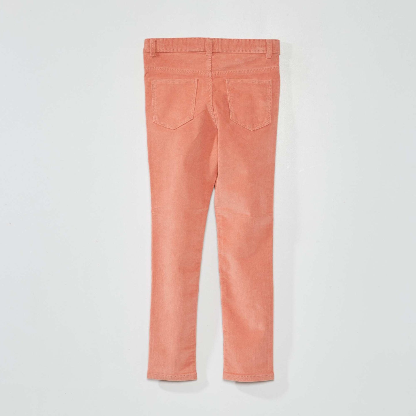 Pantalon skinny en velours uni rose