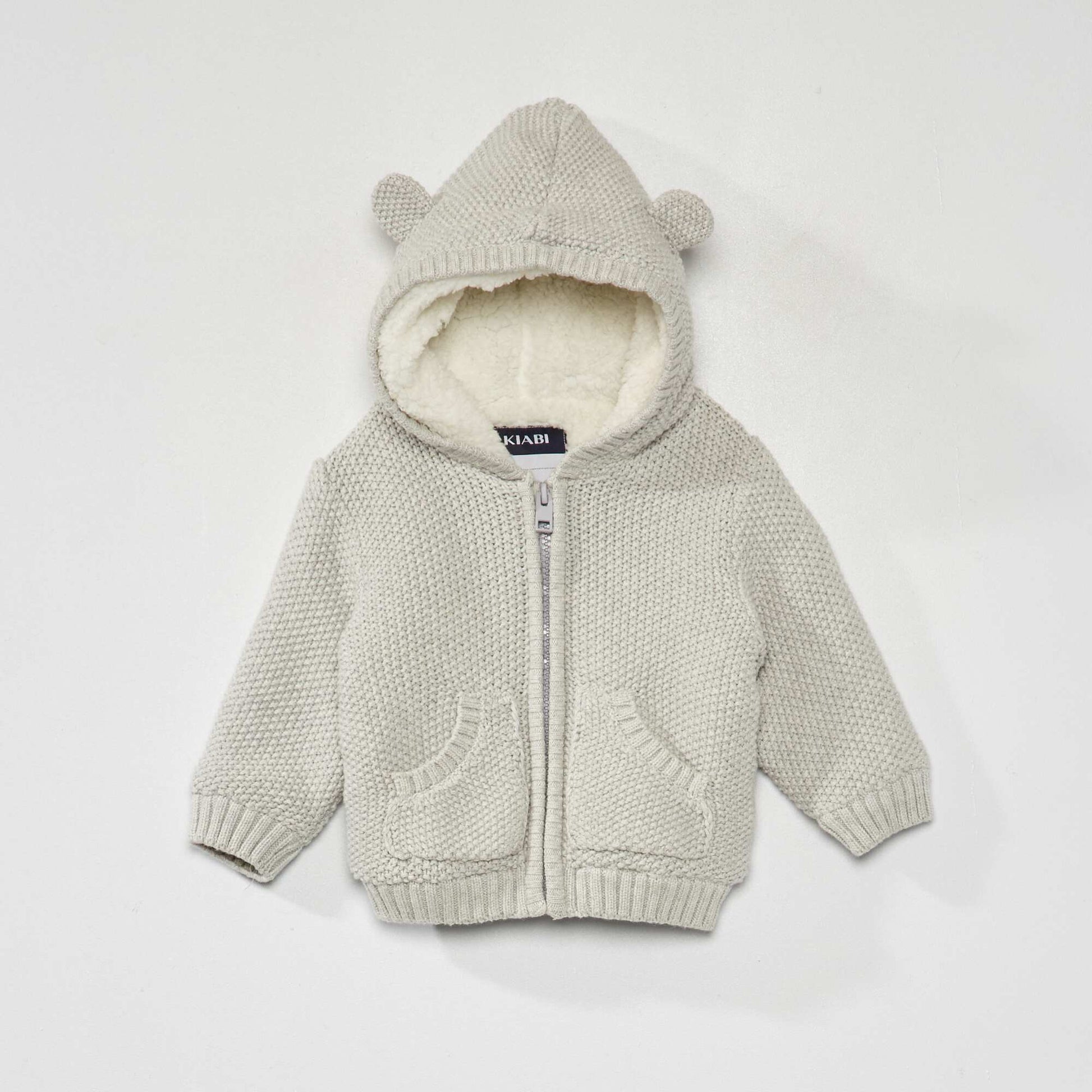 Gilet en tricot avec capuche Gris