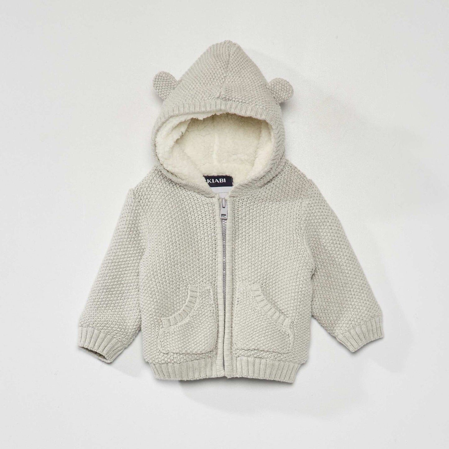 Gilet en tricot avec capuche Gris
