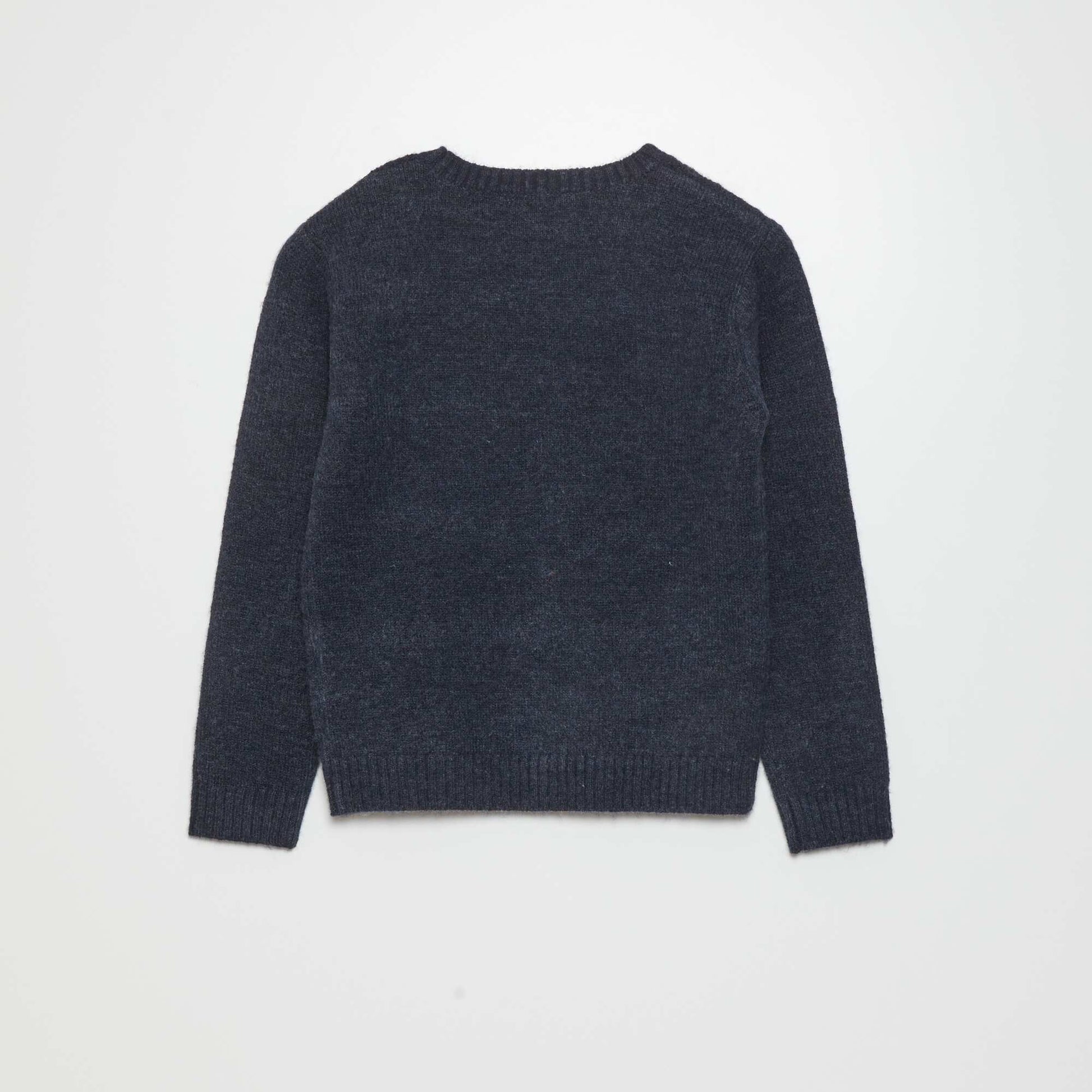Pull en maille torsad e bleu