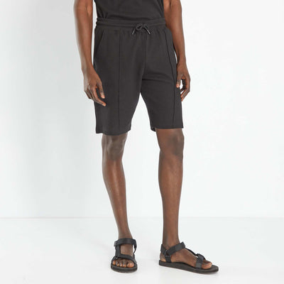 Bermuda uni en nid d'abeille noir