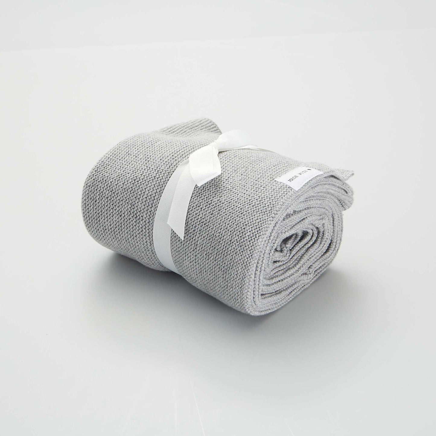 Couverture en maille tricot Gris
