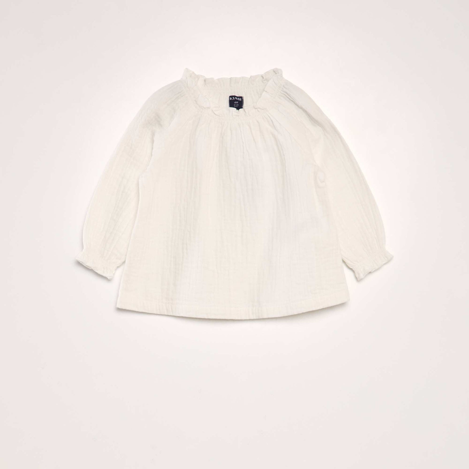 Blouse manches longues col volant e blanc