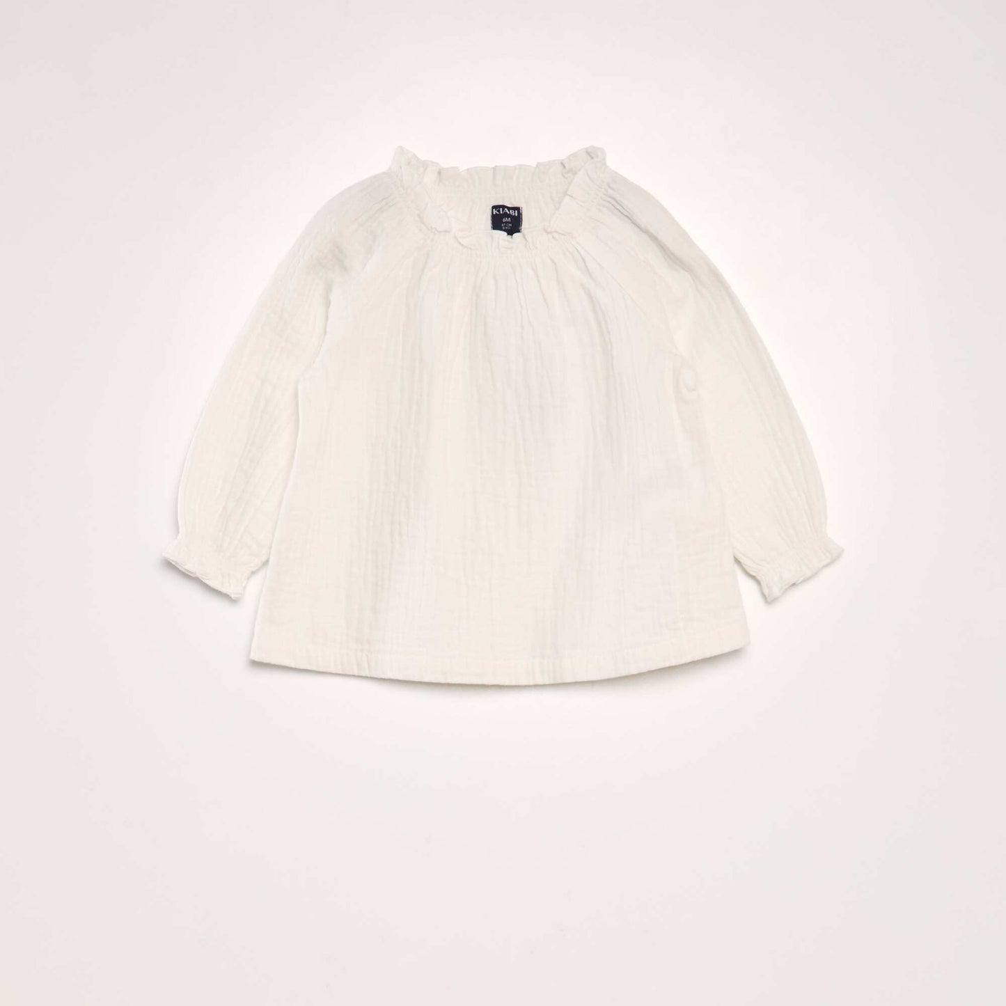 Blouse manches longues col volant e blanc