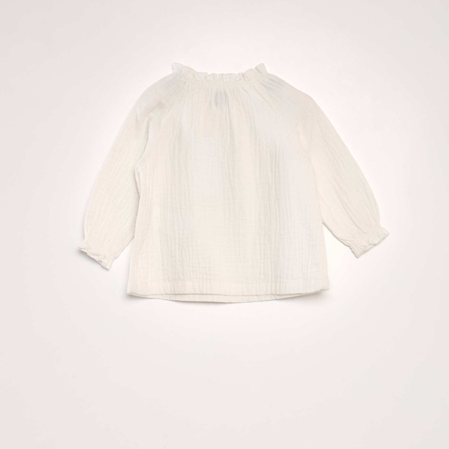 Blouse manches longues col volant e blanc