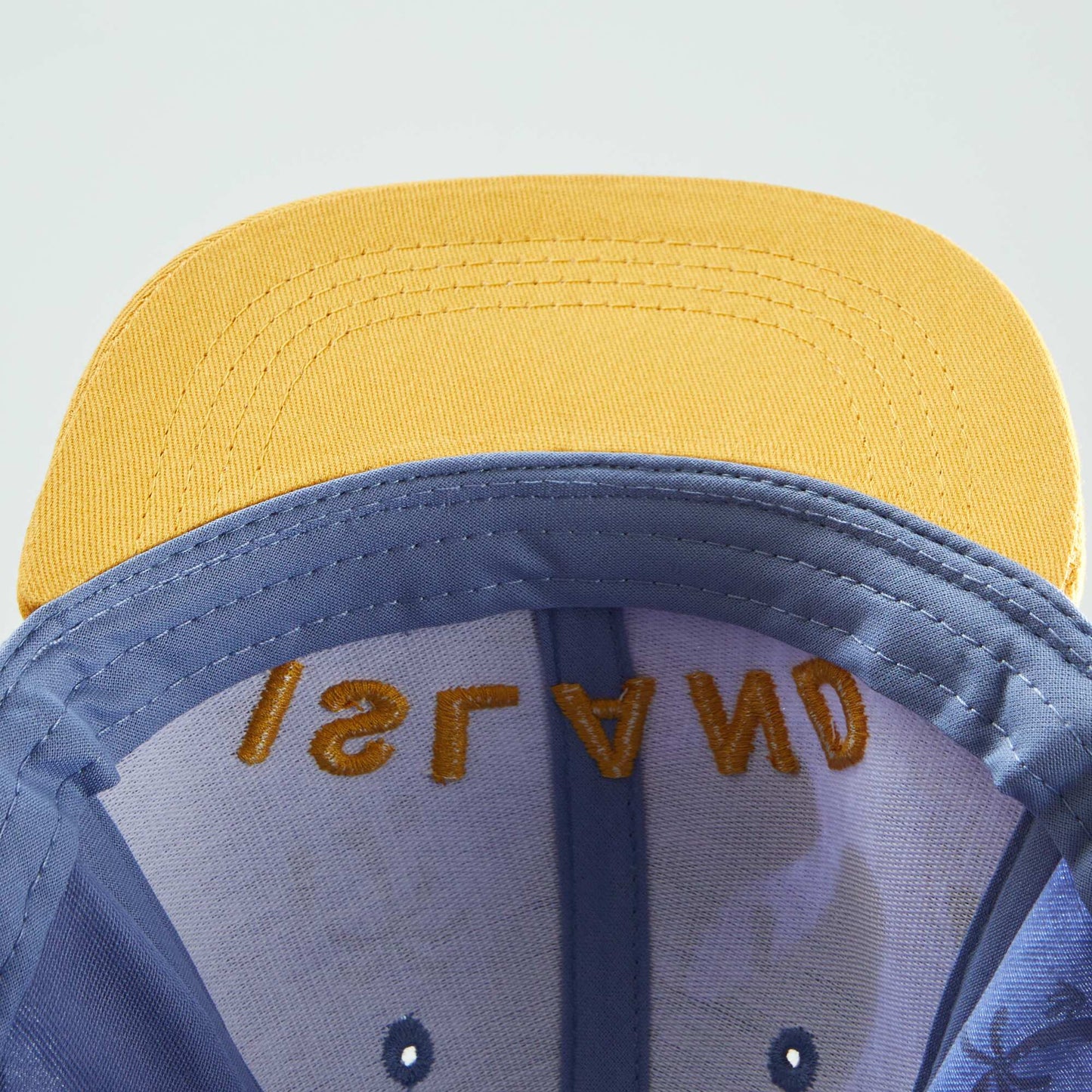 Casquette trucker broderie 'island' Bleu/jaune