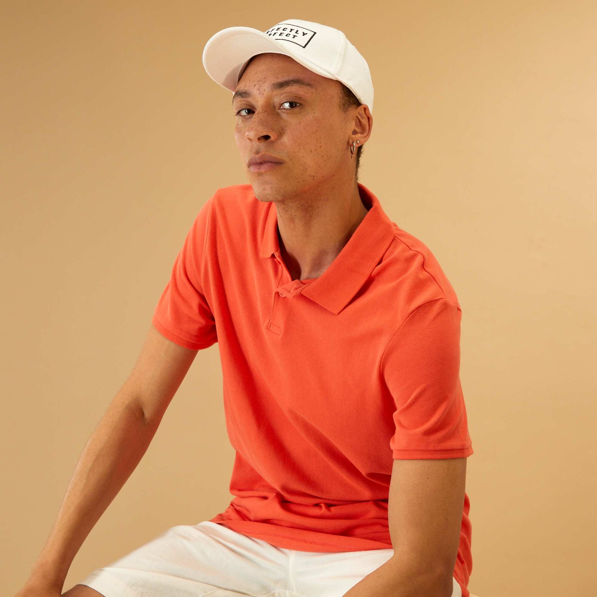Polo uni en piqu de coton rouge corail