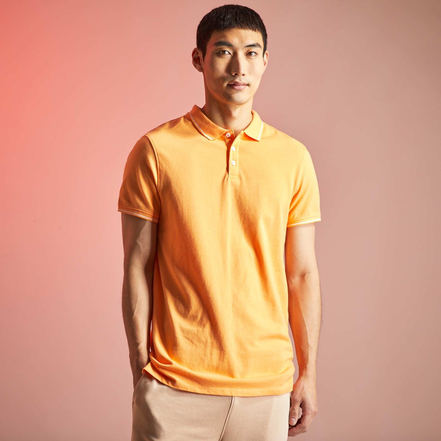 Polo en piqué de coton orange abricot