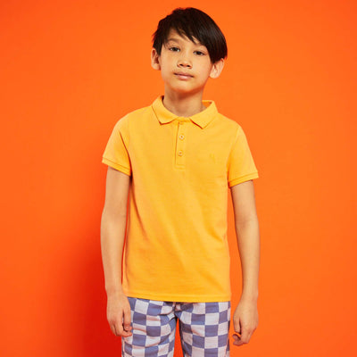 Polo en piqu de coton uni orange abricot