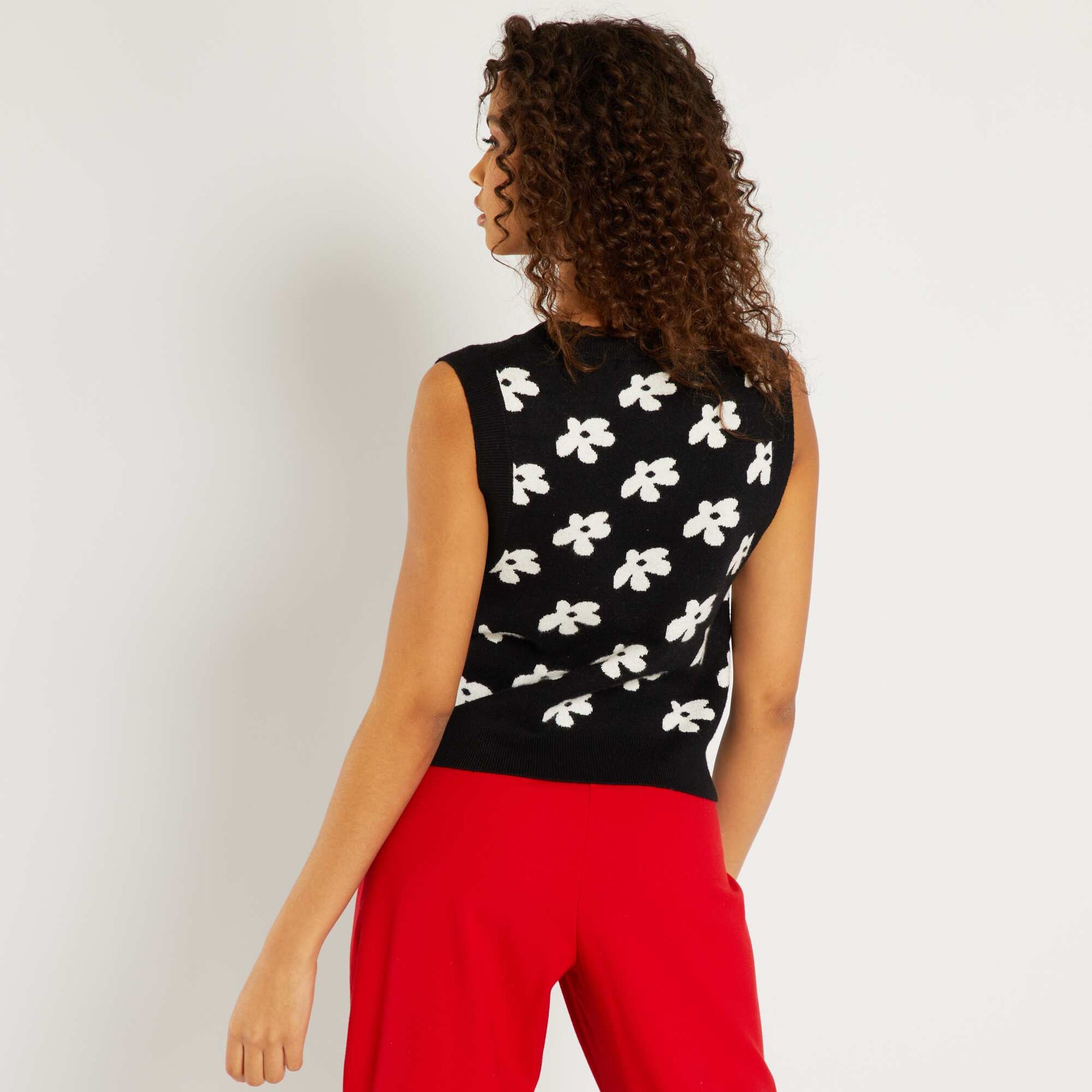 Pull col V sans manches avec imprim fleuri noir