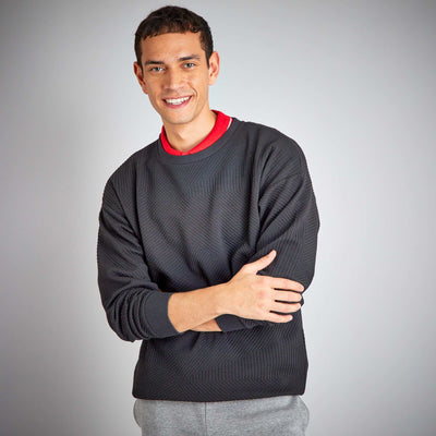 Sweat uni en maille gaufr e noir
