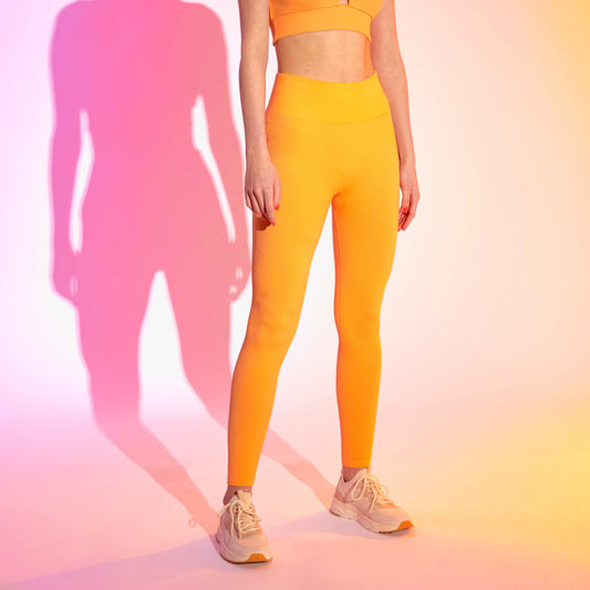 Legging de sport en maille c tel e orange abricot